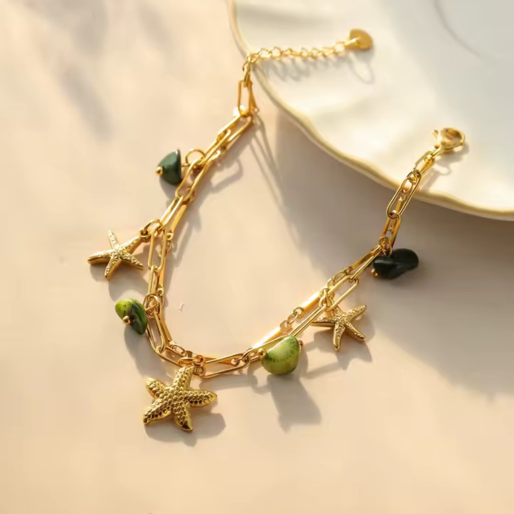 Gold Starfish bracelet with Green Accents
